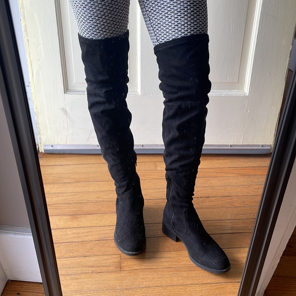 Over the knee flat boots